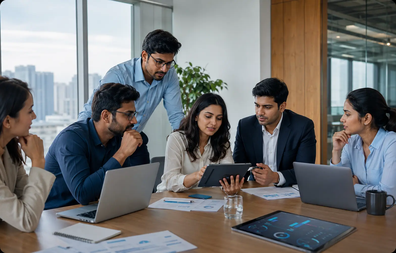 A cross-functional team collaborating in a modern office